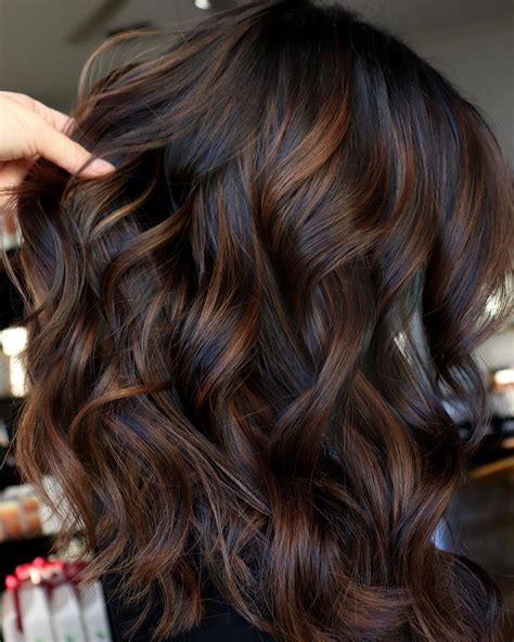 Dark chocolate brown hair color - Aug 3, 2020 · An ombre effect is one gorgeous way to lighten your hair if you have a dark chocolate-y hair color like Collins'. Ask your stylist for highlights that start at your ears for a subtle fade like ... 